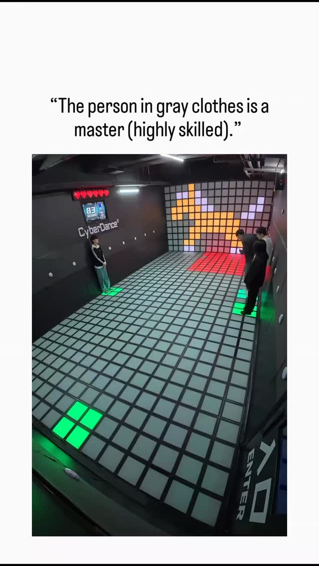 The X post by @QingQ77 shares a 47-second video of CyberDance, an interactive rhythm game on a large…
