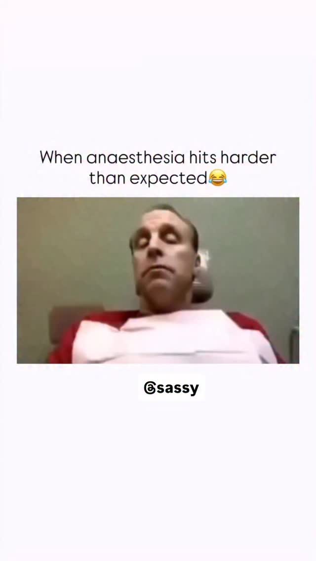 The video begins with a man reclining in a dentist’s chair, wearing a red shirt and a pink bib. A de…