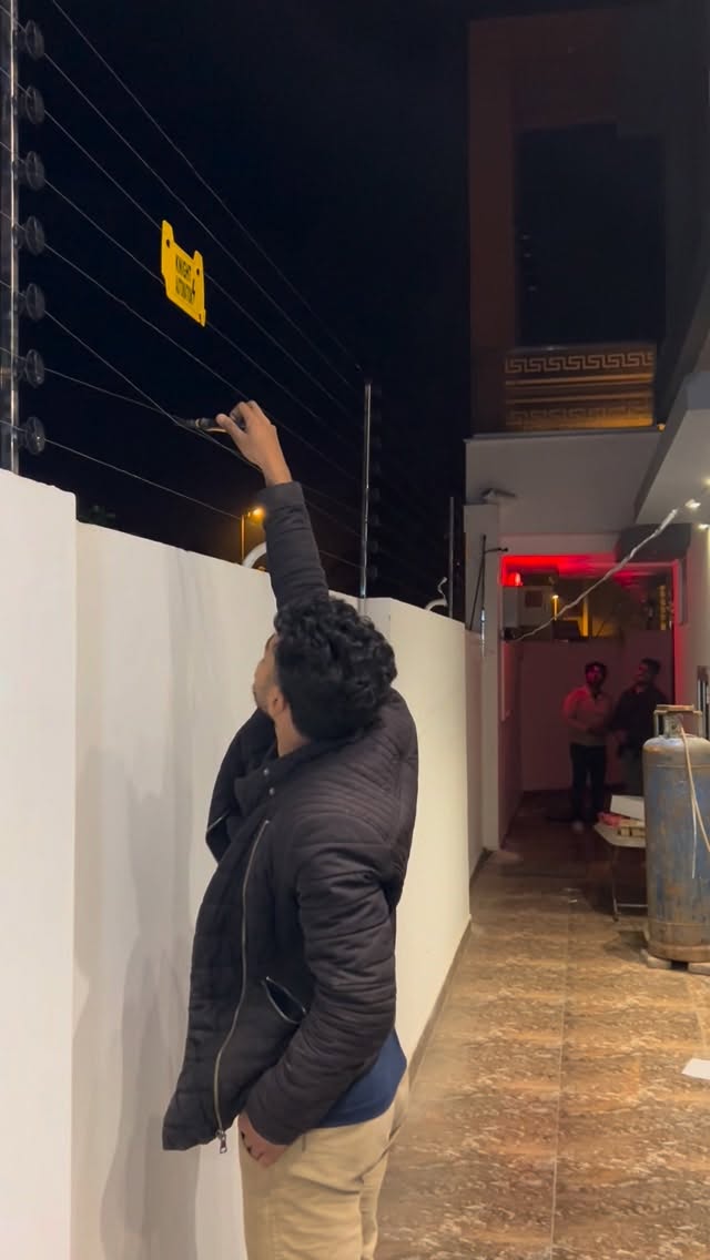 Electric fence installation #security #home #viralvideos #electricfence