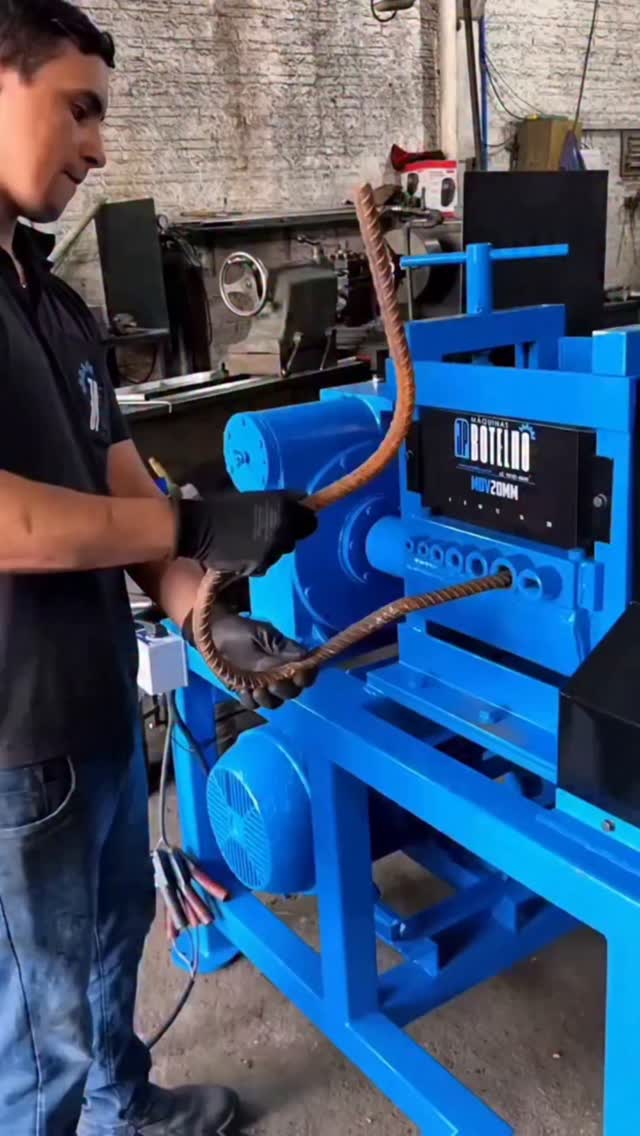 The machine in the image is a rebar straightening and reconditioning machine. It is designed to proc…