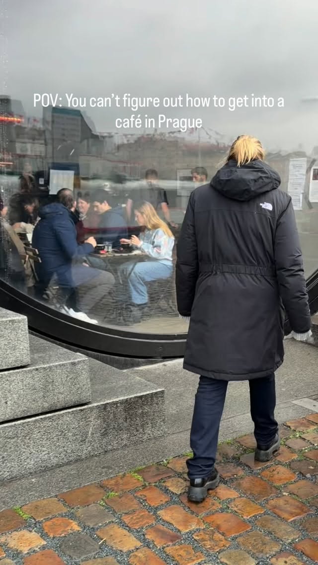 You’re standing outside a café in Prague for what feels like forever. Someone comes over to help. Th…