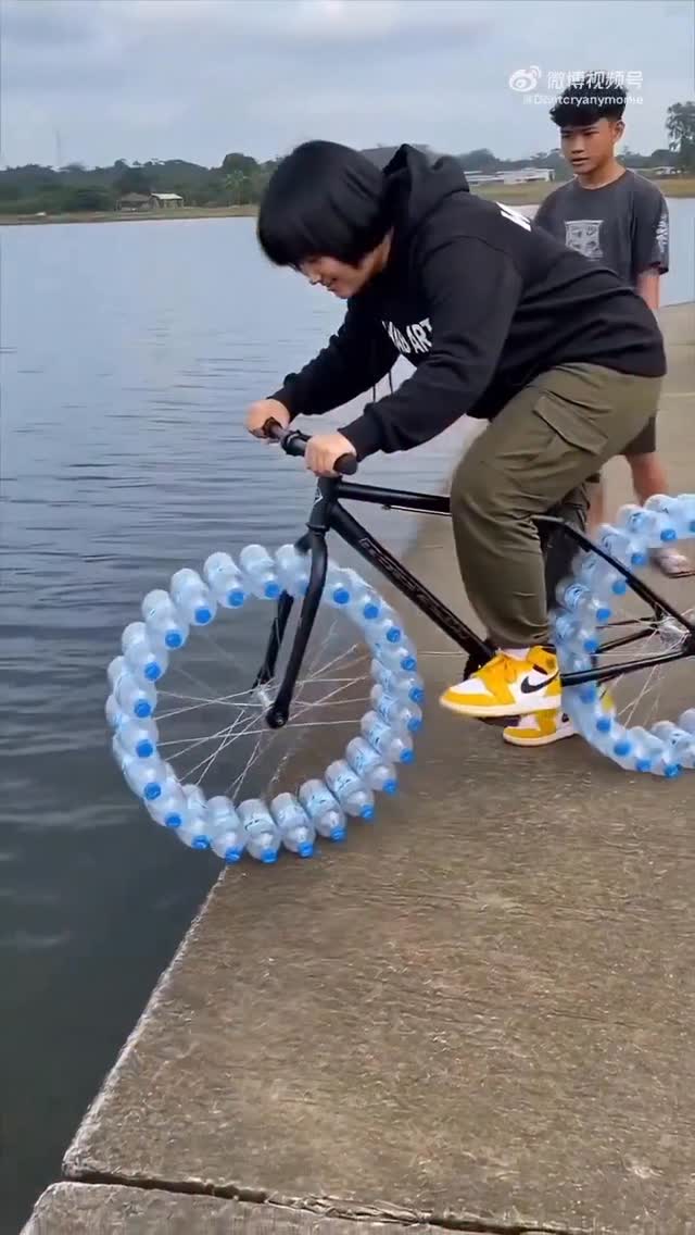 - The instagram reels post shares a video of a bicycle modified with numerous plastic bottles attach…