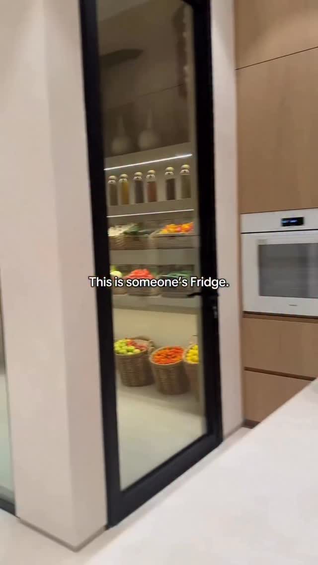 A walk-in fridge in a luxury home is a fully insulated, climate-controlled room designed as part of …
